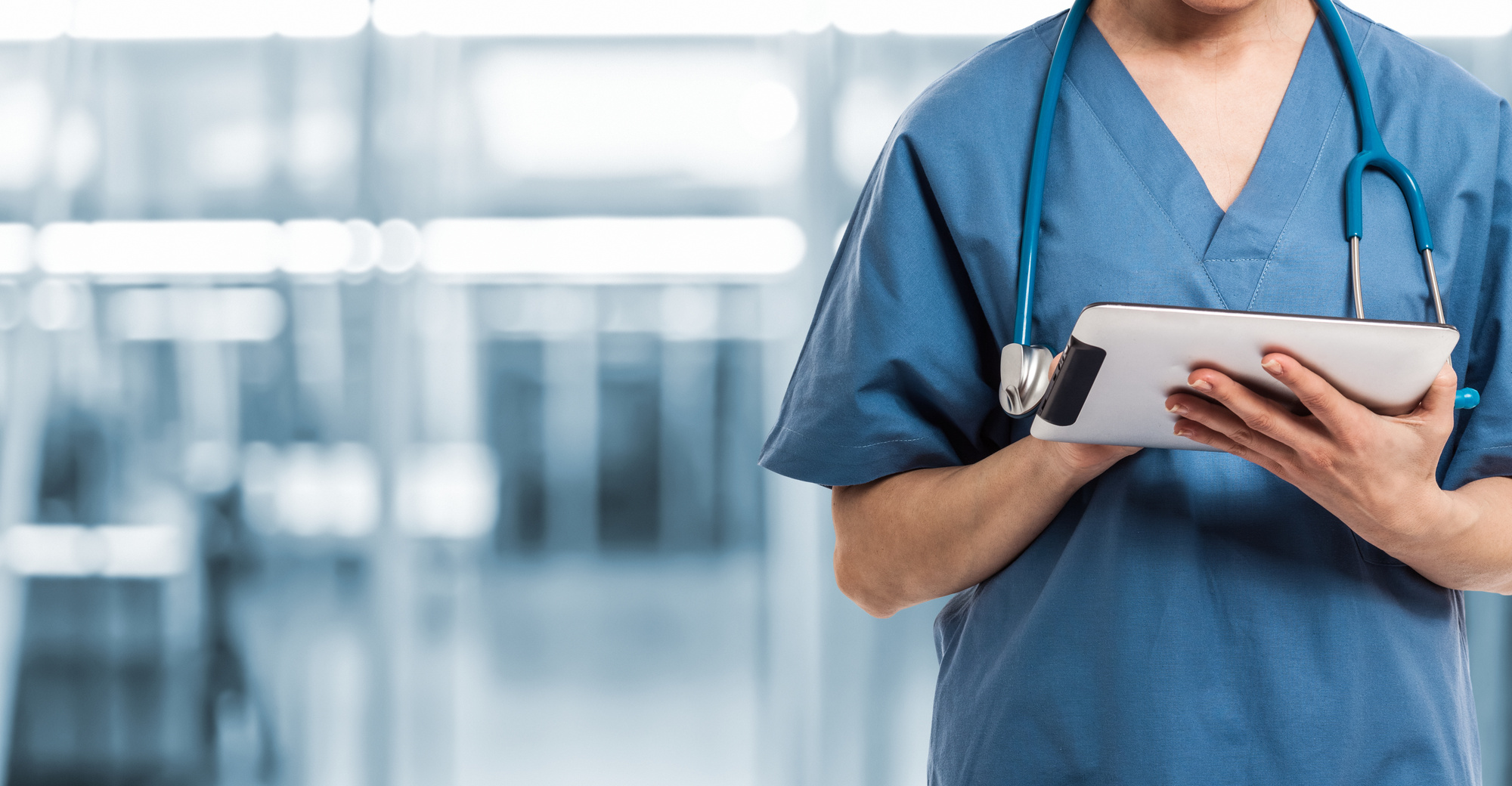 health care worker with tablet