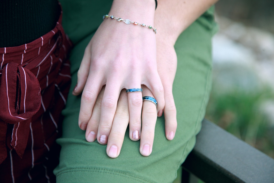 hands with wedding rings